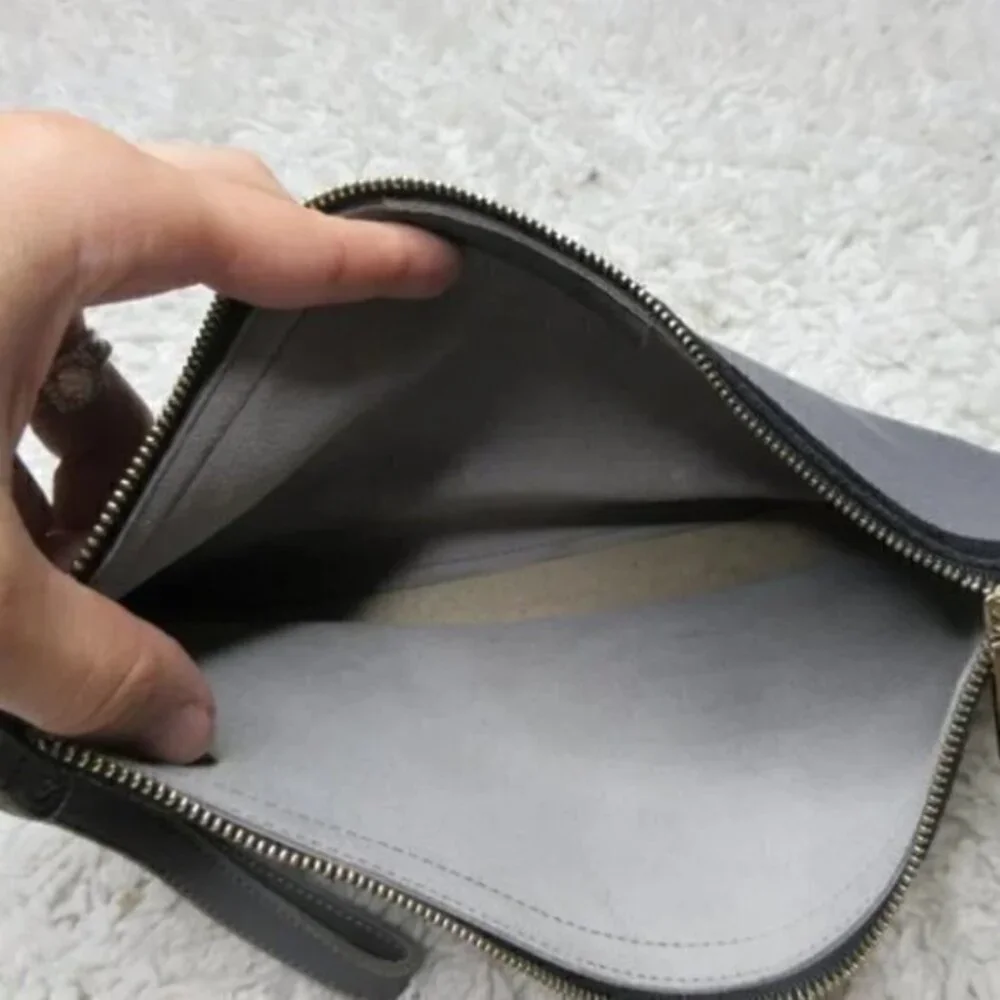 Cincinati leather boutique clutch/ make up bag‎